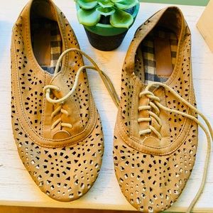 Tan leather like shoes with cut outs size 7